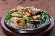 铁板焗鱼头的制作方法（学会这招，让你的鱼头更加美味！）